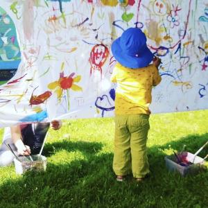 Child is painting.